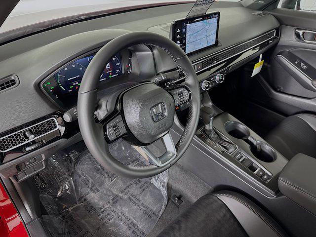 Photo of 2026 Rallye Red Honda Civic Hybrid