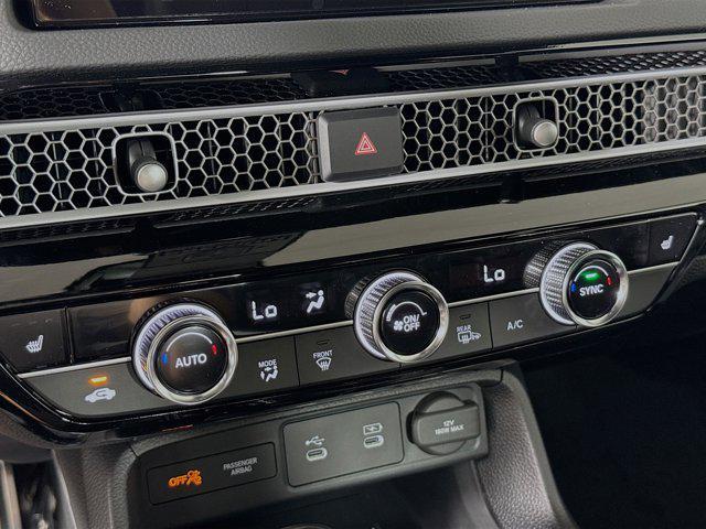 Photo of 2026 Rallye Red Honda Civic Hybrid