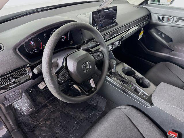 Photo of 2025 Meteorite Gray Metallic Honda Civic