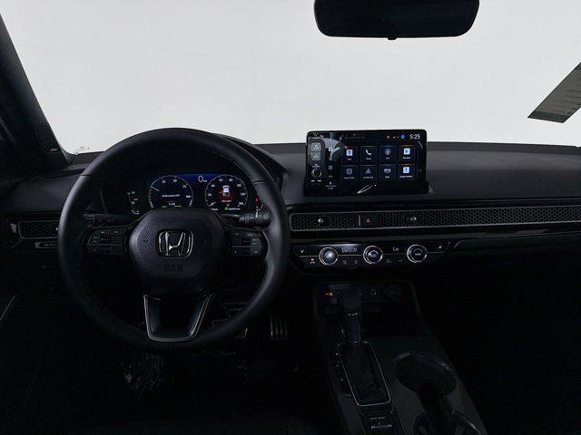 Photo of 2025 Urban Gray Pearl Honda Civic Hybrid