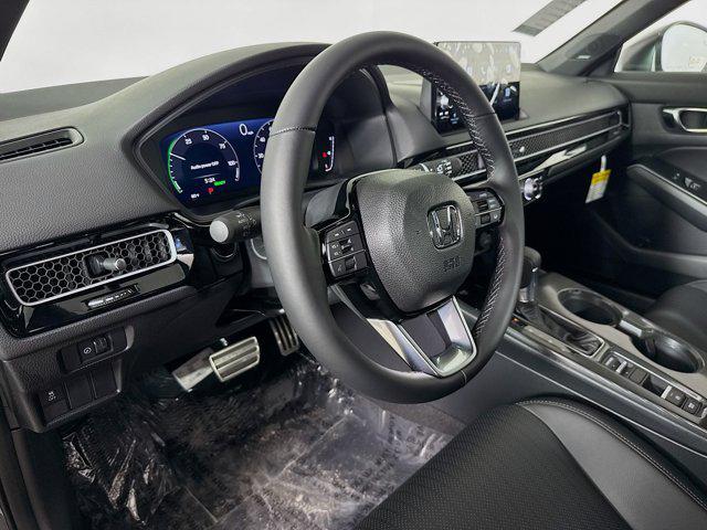 Photo of 2025 Urban Gray Pearl Honda Civic Hybrid