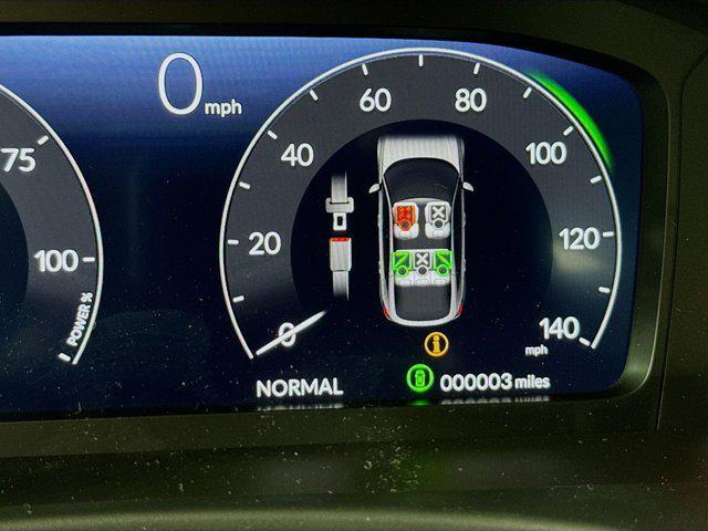 Photo of 2025 Urban Gray Pearl Honda Civic Hybrid