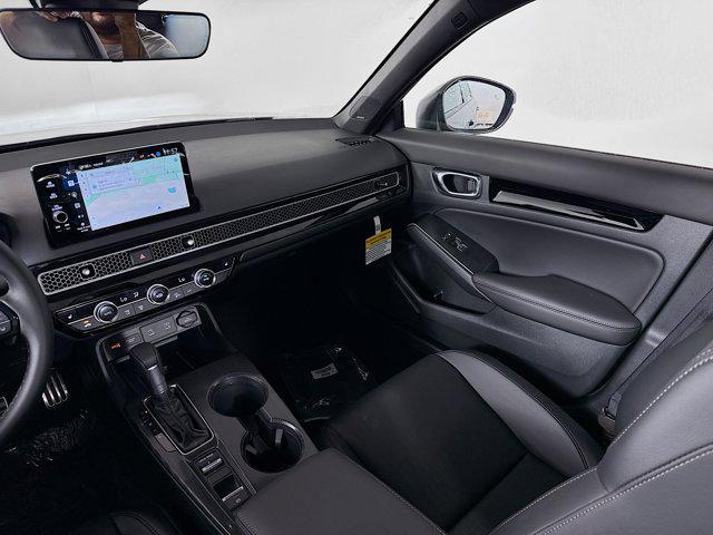 Photo of 2025 Urban Gray Pearl Honda Civic Hybrid