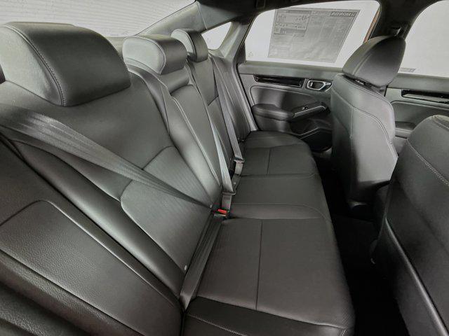 Photo of 2025 Rallye Red Honda Civic Hybrid
