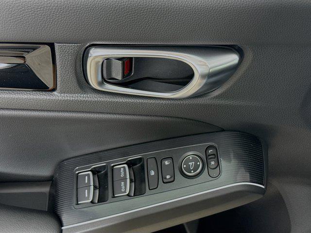Photo of 2025 Sonic Gray Pearl Honda Civic Hybrid