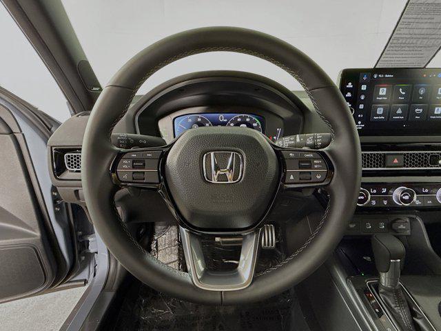 Photo of 2025 Sonic Gray Pearl Honda Civic Hybrid