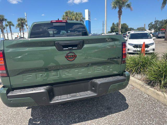 Photo of 2024 Green Metallic Nissan Frontier