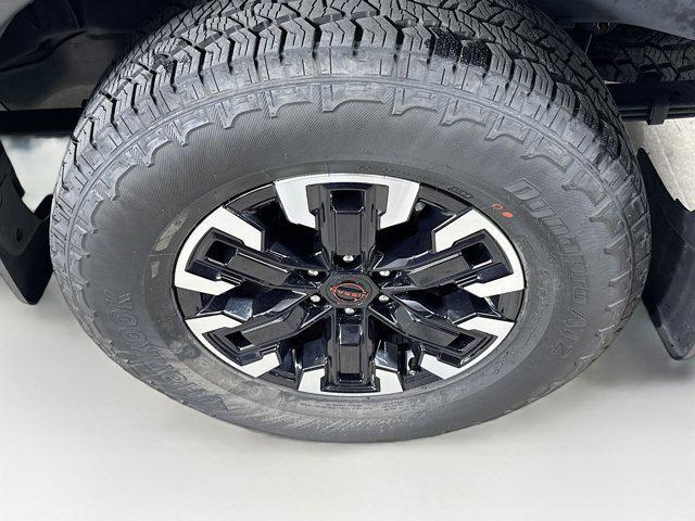 Photo of 2024 Green Metallic Nissan Frontier