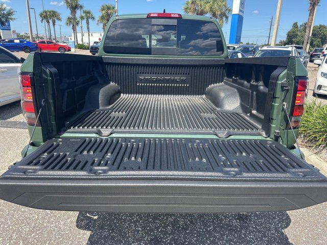 Photo of 2024 Green Metallic Nissan Frontier