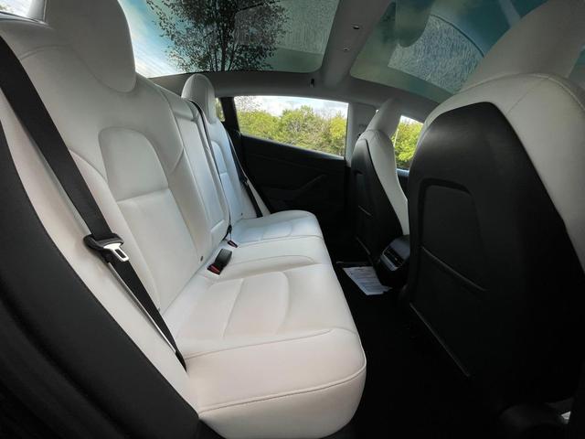 Photo of 2023 Solid Black Tesla Model 3