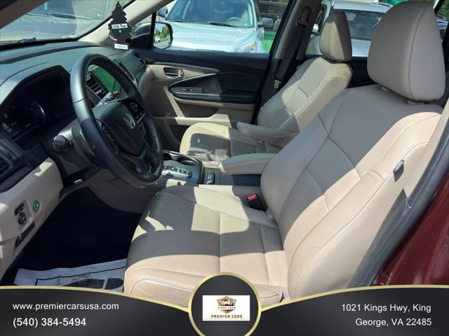 Photo of 2021 Burgundy Honda Pilot