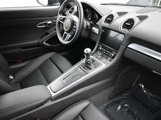 Photo of 2024 Black Porsche 718 Cayman