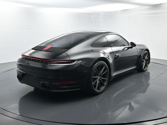 Photo of 2023 Jet Black Metallic Porsche 911