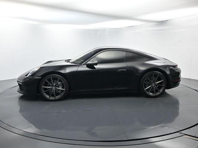 Photo of 2023 Jet Black Metallic Porsche 911