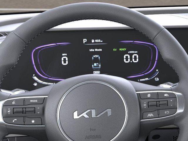 Photo of 2025 Jungle Green Kia Sportage Plug-In Hybrid