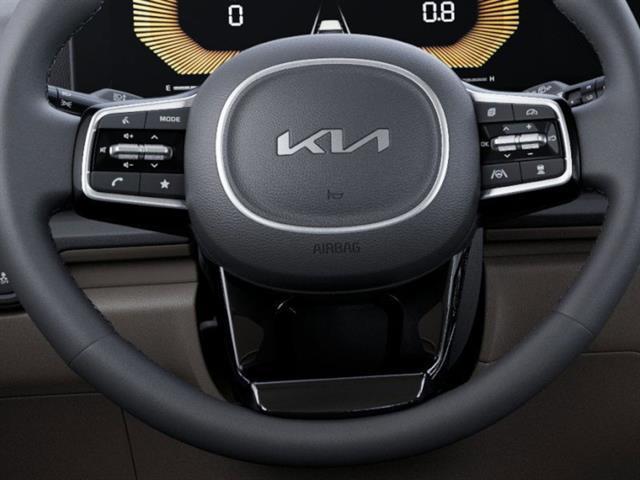 Photo of 2026 Deep Chroma Blue Kia Carnival Hybrid