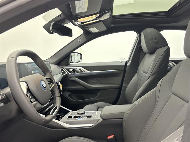 Photo of 2025 Black Sapphire Metallic BMW i4 Gran Coupe