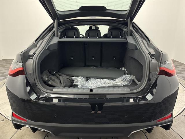Photo of 2025 Black Sapphire Metallic BMW i4 Gran Coupe