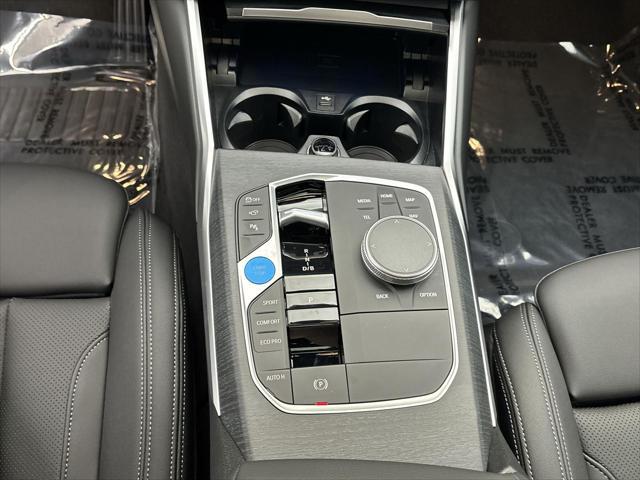 Photo of 2025 Black Sapphire Metallic BMW i4 Gran Coupe