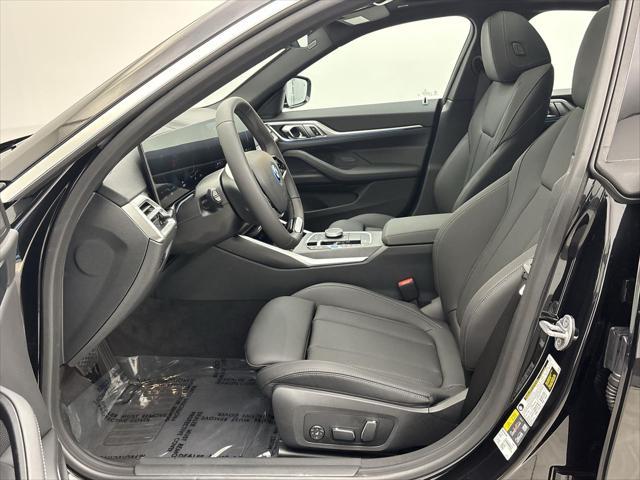 Photo of 2025 Black Sapphire Metallic BMW i4 Gran Coupe
