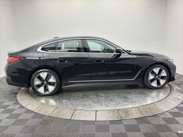 Photo of 2025 Black Sapphire Metallic BMW i4 Gran Coupe