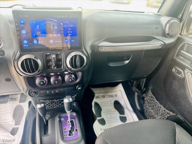 Photo of 2016 Black Jeep Wrangler Unlimited