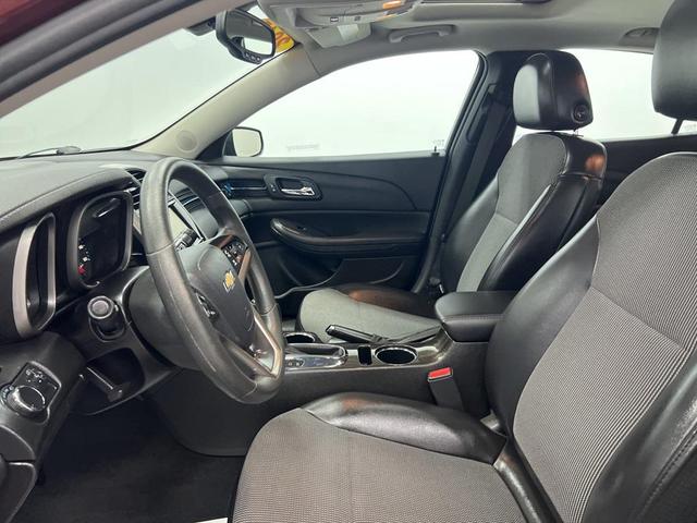 Photo of 2015 Butte Red Metallic Chevrolet Malibu
