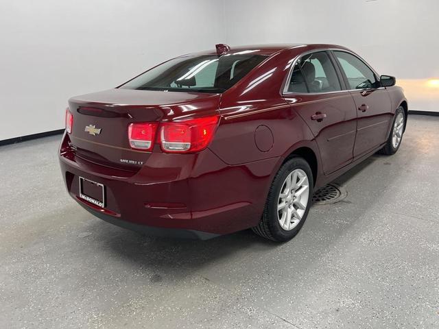 Photo of 2015 Butte Red Metallic Chevrolet Malibu