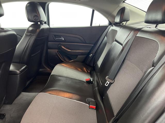 Photo of 2015 Butte Red Metallic Chevrolet Malibu