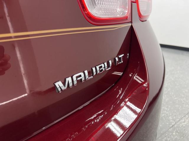 Photo of 2015 Butte Red Metallic Chevrolet Malibu