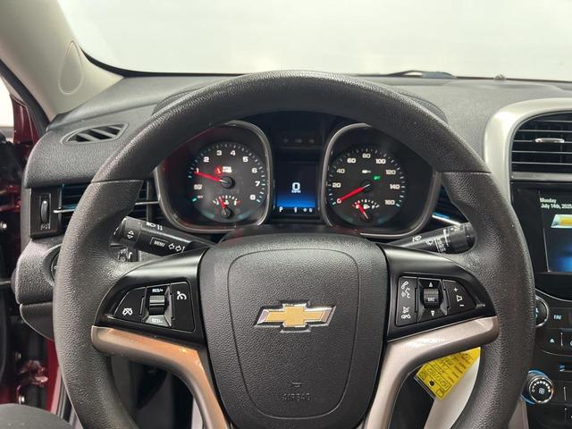 Photo of 2015 Butte Red Metallic Chevrolet Malibu