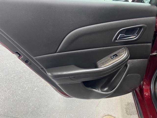 Photo of 2015 Butte Red Metallic Chevrolet Malibu