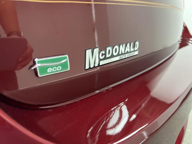 Photo of 2015 Butte Red Metallic Chevrolet Malibu