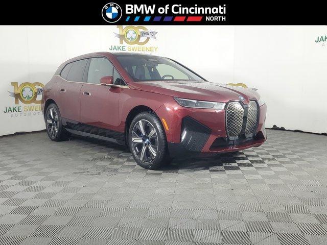Photo of 2025 Aventurin Red Metallic BMW iX