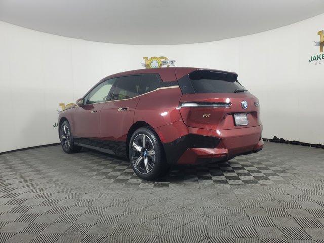 Photo of 2025 Aventurin Red Metallic BMW iX