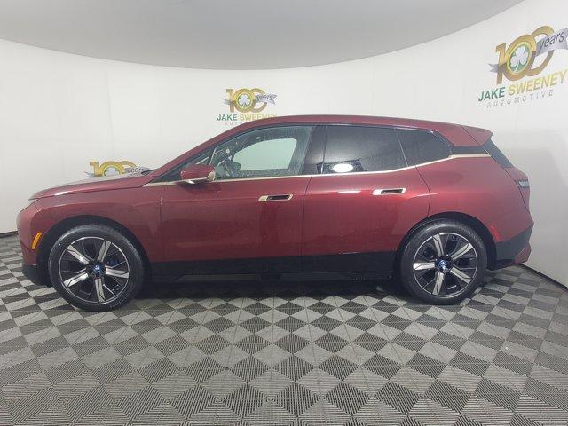 Photo of 2025 Aventurin Red Metallic BMW iX