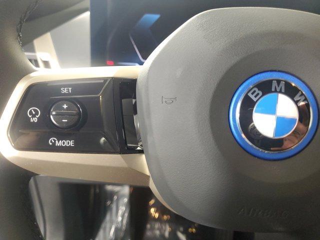 Photo of 2025 Aventurin Red Metallic BMW iX
