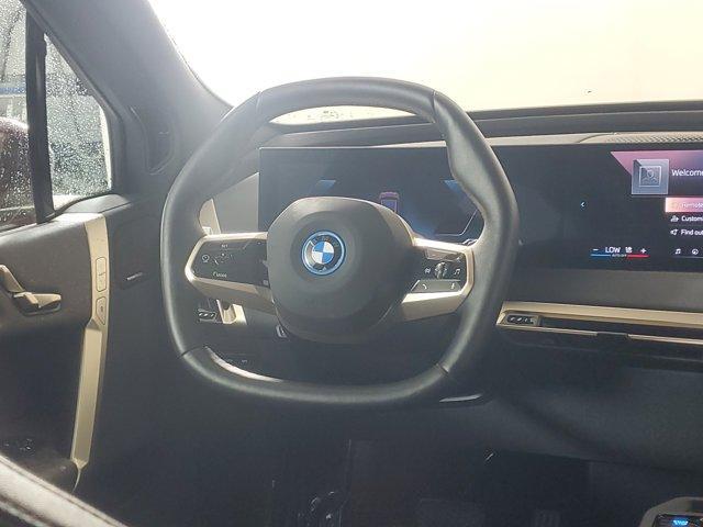 Photo of 2025 Aventurin Red Metallic BMW iX