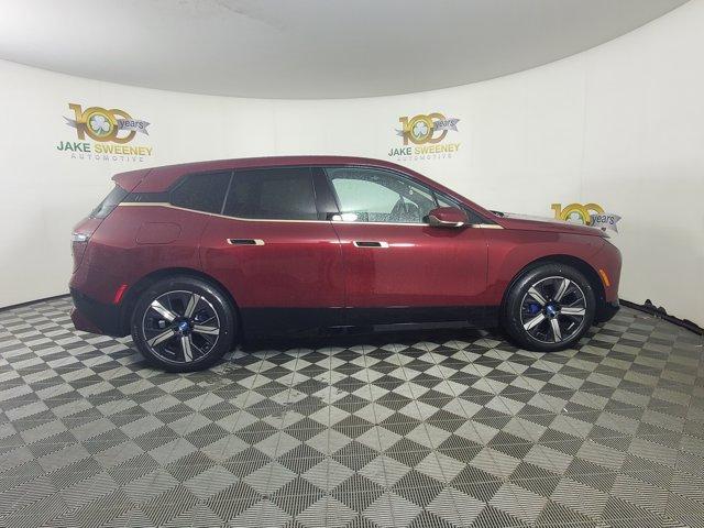 Photo of 2025 Aventurin Red Metallic BMW iX