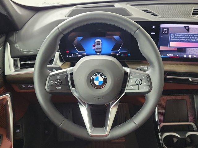 Photo of 2026 Green Metallic BMW X1