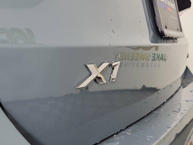 Photo of 2026 Green Metallic BMW X1