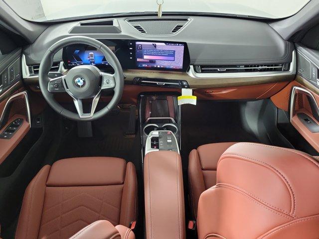 Photo of 2026 Green Metallic BMW X1