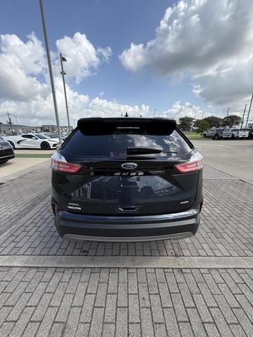 Photo of 2024 Stone Blue Metallic Ford Edge