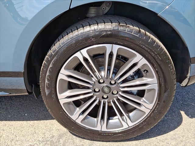 Photo of 2025 Tribeca Blue Metallic Land Rover Range Rover Evoque