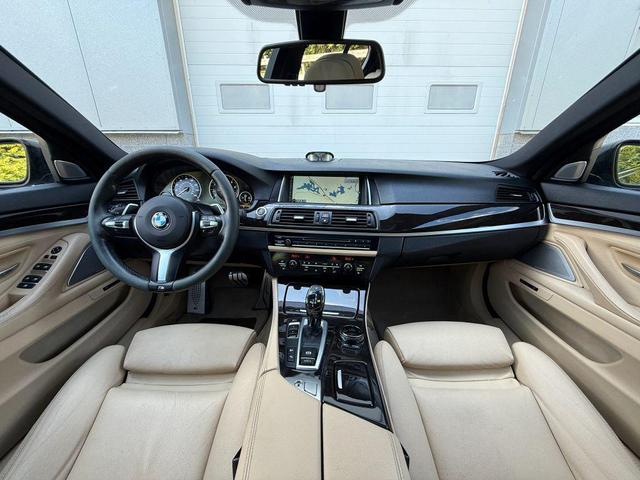 Photo of 2015 Blue BMW 550