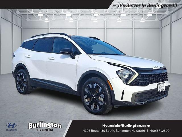 Photo of 2023 Glacial White Pearl Kia Sportage