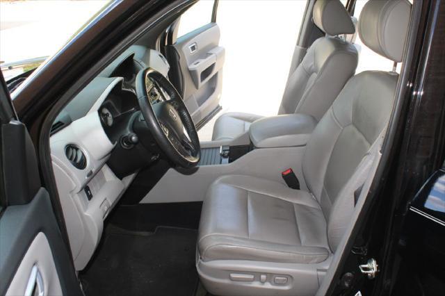 Photo of 2015 Crystal Black Pearl Honda Pilot