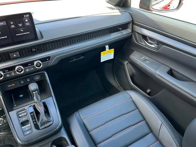 Photo of 2026 Radiant Red Metallic Honda CR-V Hybrid