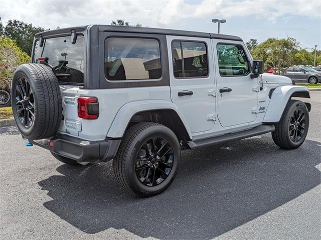 Photo of 2022 Bright White Clearcoat Jeep Wrangler Unlimited 4xe