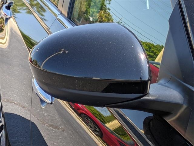 Photo of 2023 Super Black Clearcoat Nissan Altima